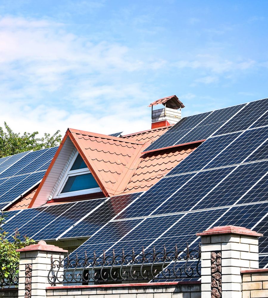 solar panels, Close up shot of a solar panel array with blue sky, Solar panels on a roof for electric power generation, Solar panel on a red roof reflecting the sun