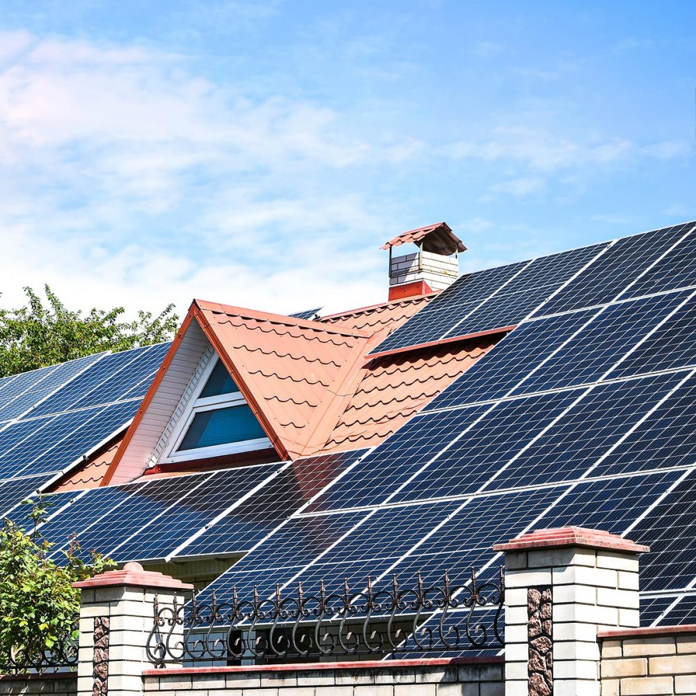 solar panels, Close up shot of a solar panel array with blue sky, Solar panels on a roof for electric power generation, Solar panel on a red roof reflecting the sun